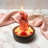 the lit image of the Garden of Us - Sculpted Couple & Roses Wooden Candle for Valentines Day